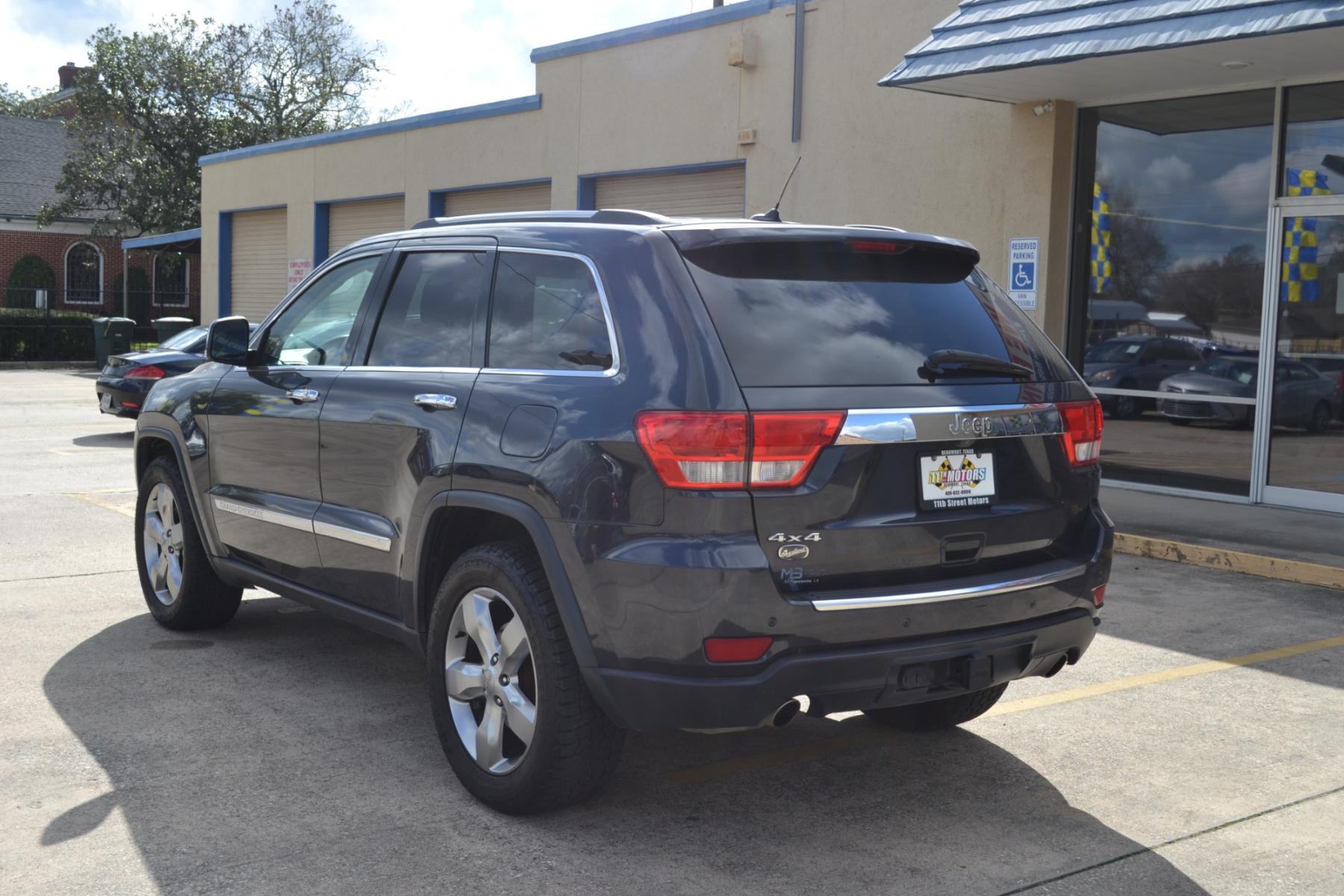 2013 Mineral Gray Metallic /Black Leather Interior Jeep Grand Cherokee Overland 4WD (1C4RJFCT1DC) with an 5.7L V8 OHV 16V engine, 5-Speed Automatic transmission, located at 1355 North 11th Street, Beaumont, 77702, (409) 832-0006, 30.094290, -94.130096 - Photo #2